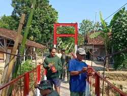 Warna Merah Putih Percantik Jembatan Gantung Garuda, Simbol Kebersamaan TNI Dan Masyarakat