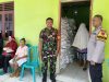 Babinsa Koramil 07/Wedi Monitoring Penyaluran Bantuan Beras Di Desa Melikan